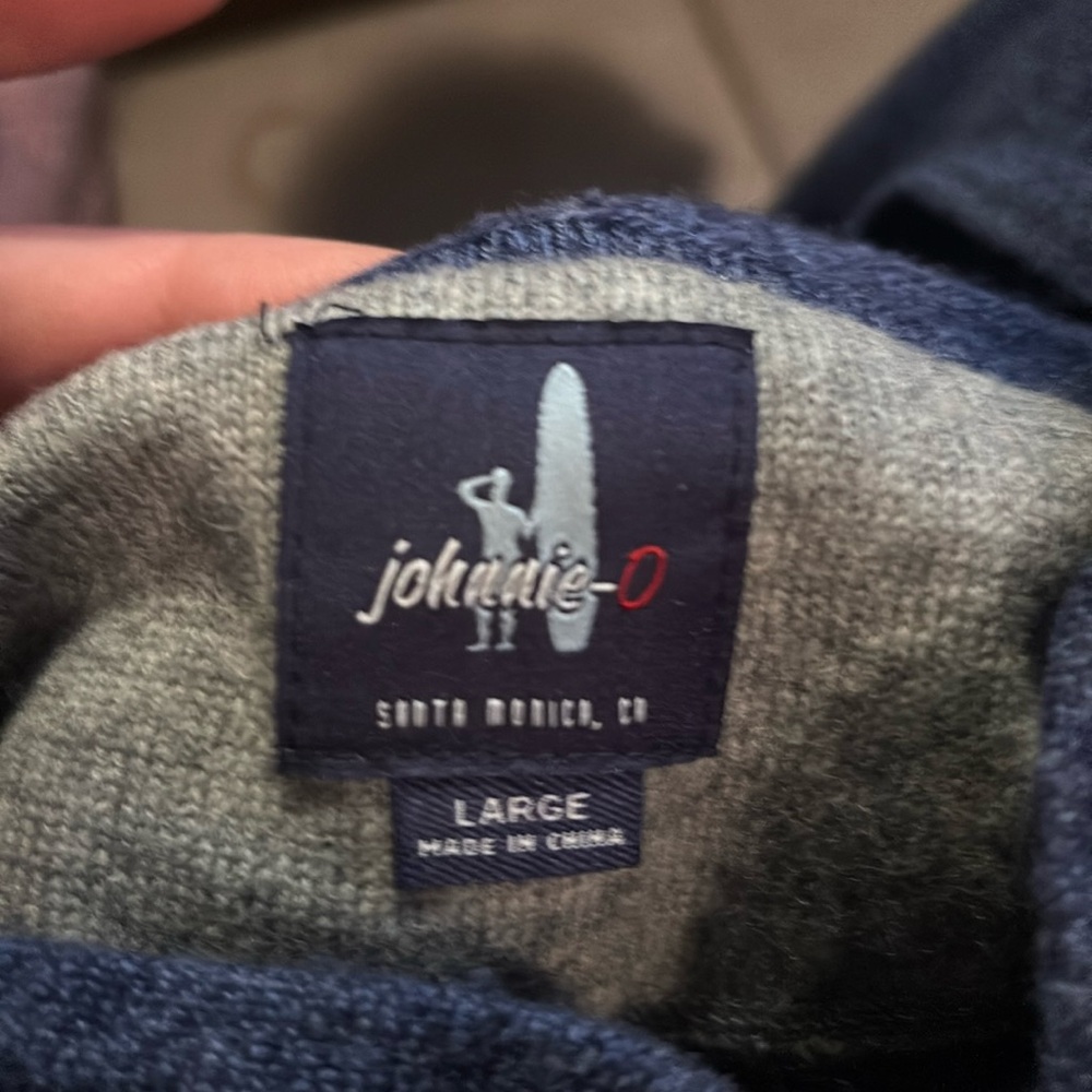 Johnnie-O cashmere/wool blend sweater.  It’s a quarter-zip with a hood.